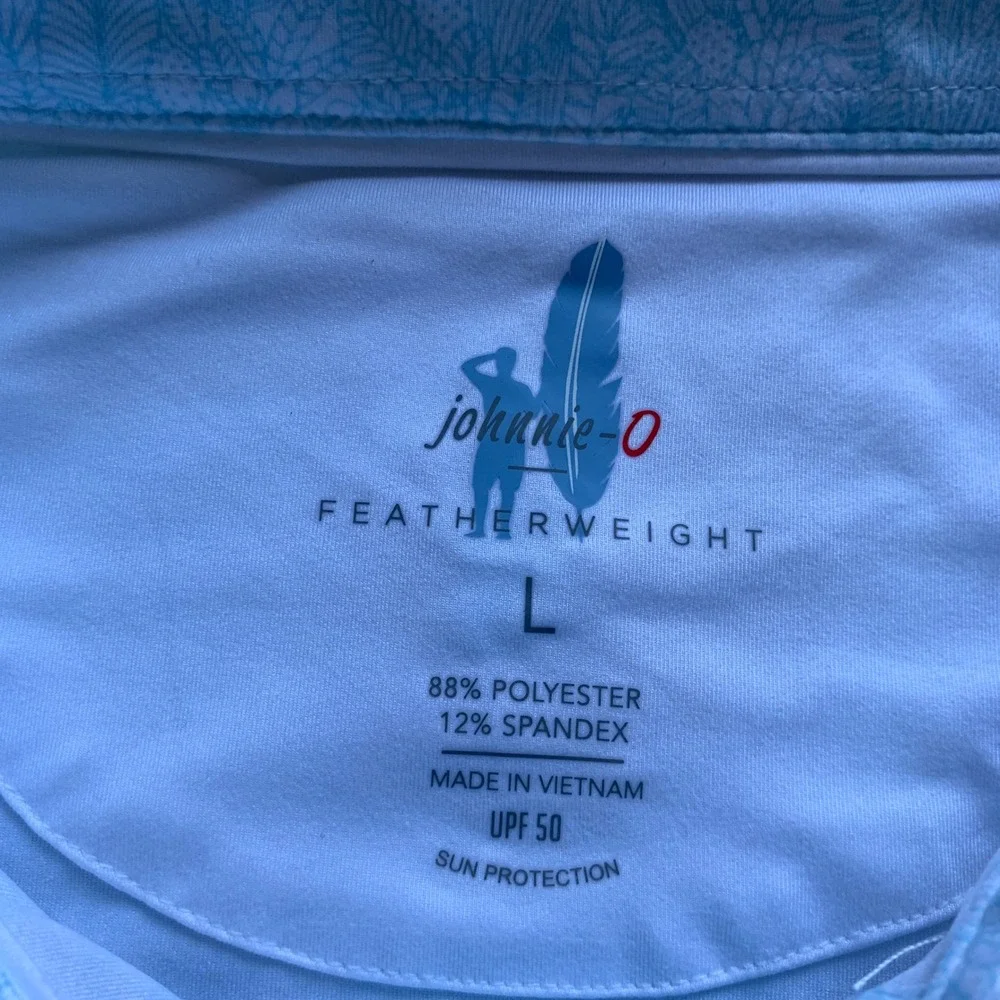 Johnnie-O Clegg Solid Piqué‎ Performance Golf Polo in light blue